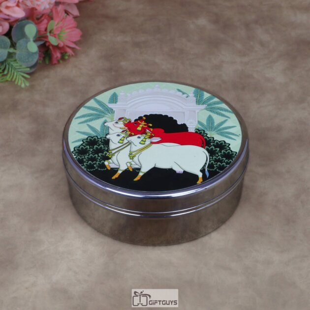 Traditional Kamdhenu Pichwai Print Stainless Steel Round Box – 6.5x2.5 Inch Decorative Sacred Art Gift Box for Sweets, Dry Fruits & Wedding Favors (320g)